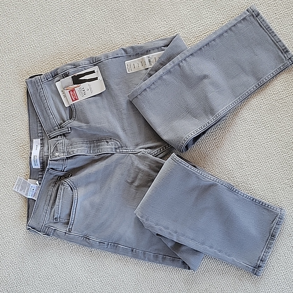 Light Black Slim Signature Super Flex Jeans by Levi's Strauss